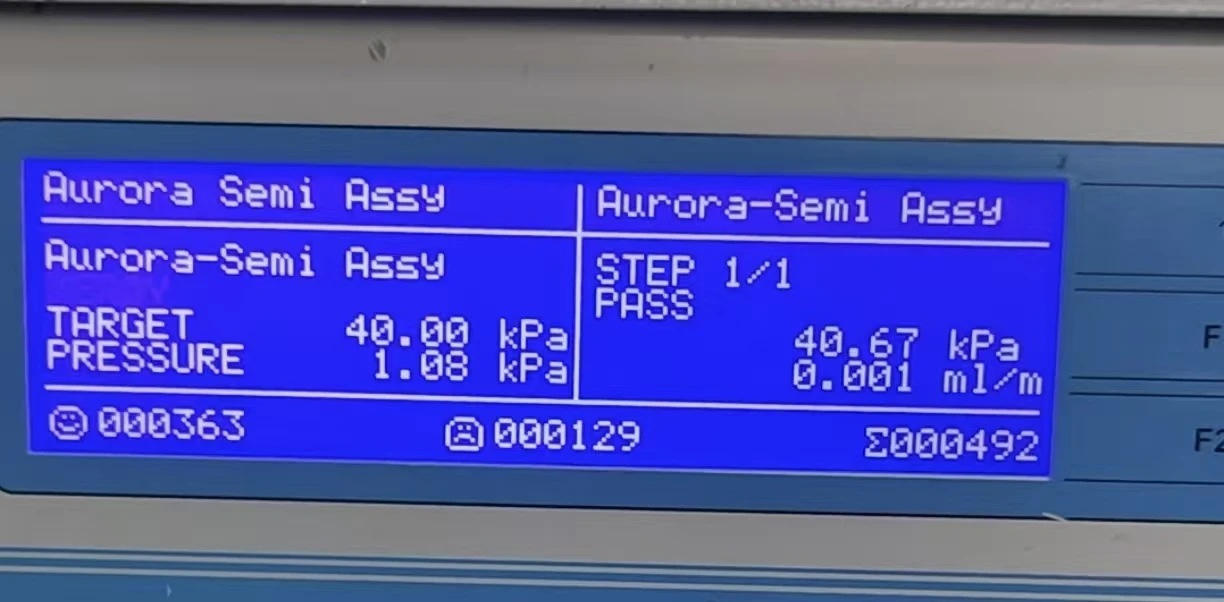 弗内斯检漏仪实测界面：40.67 kPa 压力下泄漏率 0.001 ml/min，判定 PASS